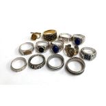 Various dress rings together with a yellow metal tie stud