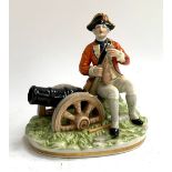 A Capodimonte figure of a Napoleonic soldier and cannon, 20cmH