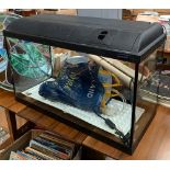 A Light Glo fish tank, 80x35cm; together with one other smaller, and a number of accessories