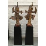 A pair of Thai Kinnara temple guardians, each approx. 76cmH, supported by black painted pedestal