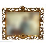 A Continental gilt mirror within a scrolling acanthus frame, 90cm x 73cm