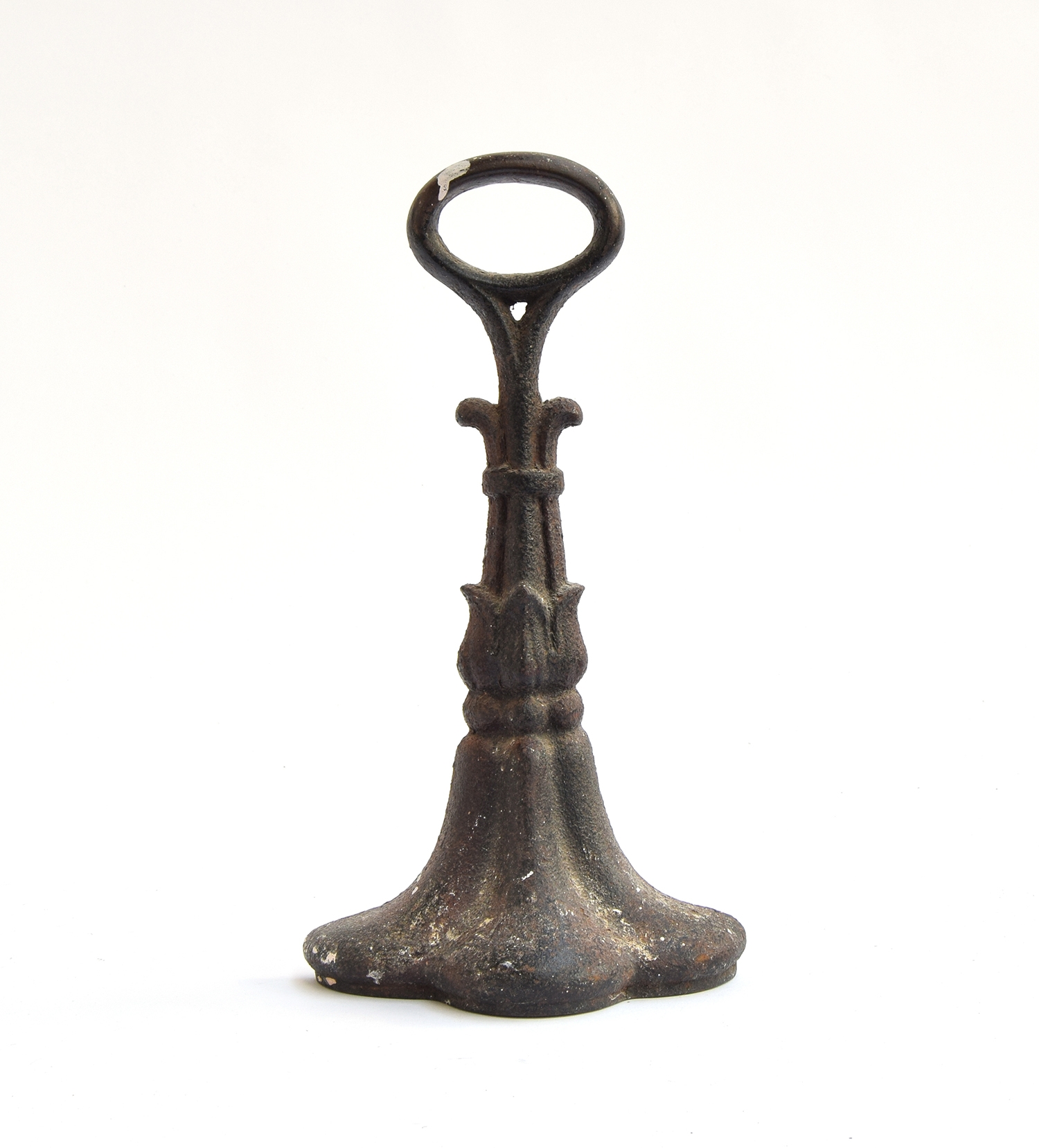 A 19th century Coalbrookdale cast iron door stop, marked to base, 29cm high