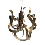 A pair of Jacco Maris Ruban Plie ceiling light in brass and copper