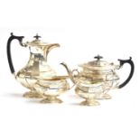 A four piece silver teaset by Elkington & Co, Birmingham 1926, comprising teapot, coffee pot, milk