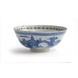 An 18th century Chinese export blue and white punch bowl, the exterior decorated with pagoda and