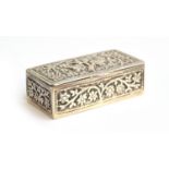 A late 19th century Middle Eastern white metal snuff box, rectangular with chased design of