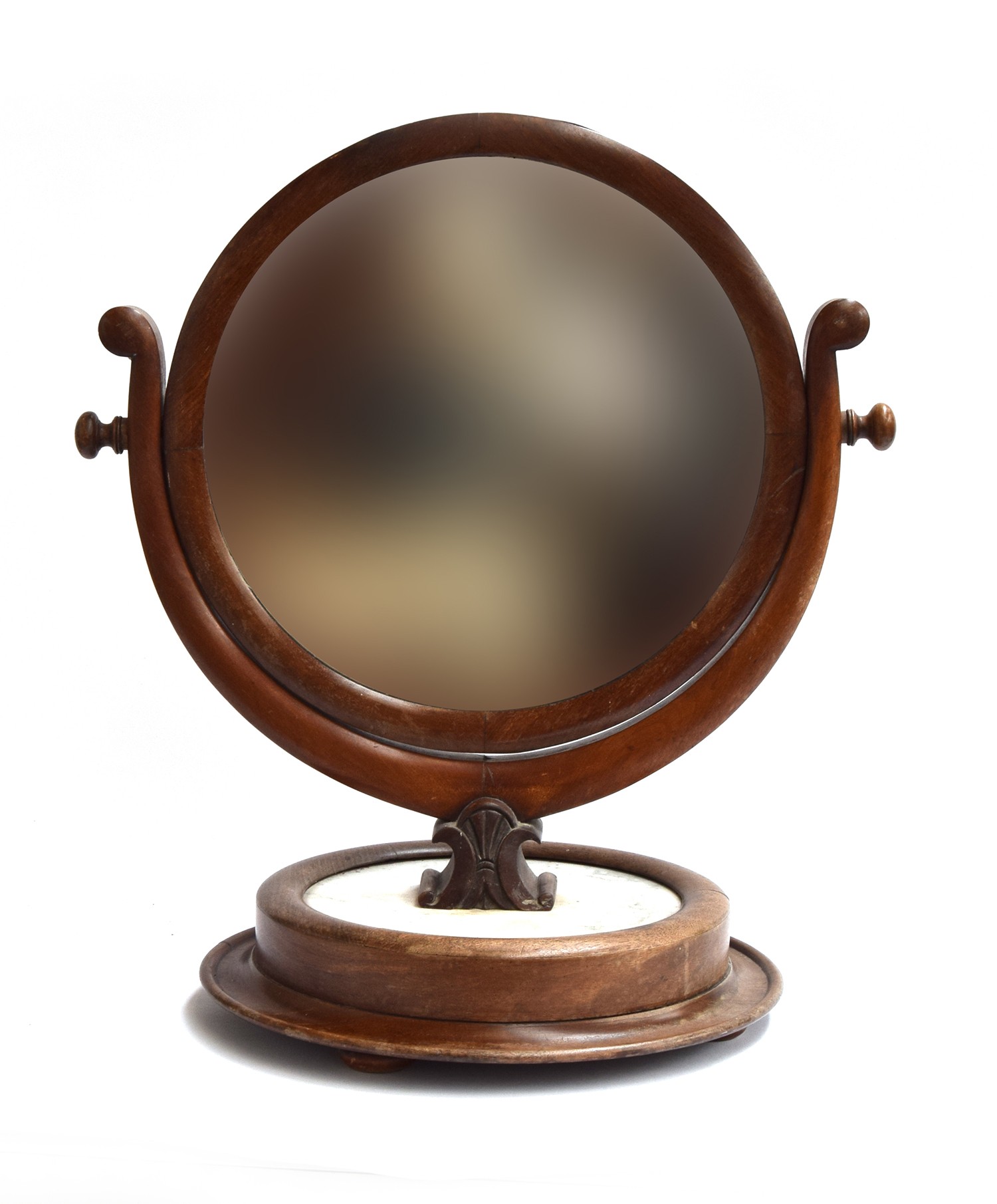 A Victorian circular mahogany adjustable shaving mirror, on a marble and turned wooden plinth