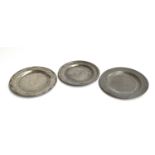 Three 19th century pewter plates, one by Allen Bright, 21cm diameter; the two others marked