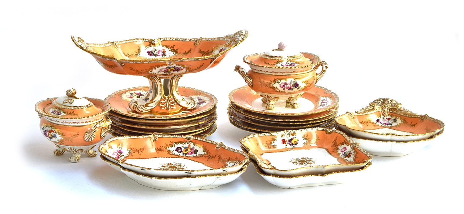 A Davenport part dinner service, 21 pieces, orange with hand painted floral sprays, heightened in