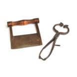 A 19th century steel sugar loaf cutter, made by W&C Wynn, 26cm long; together with a dough cutter,