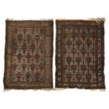 A pair of small Afshar rugs, South West Persia, each 102x145cm