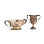 A twin handled silver pedestal bowl by Finnegan's Ltd, Birmingham 1923, 13.5cm diameter; together