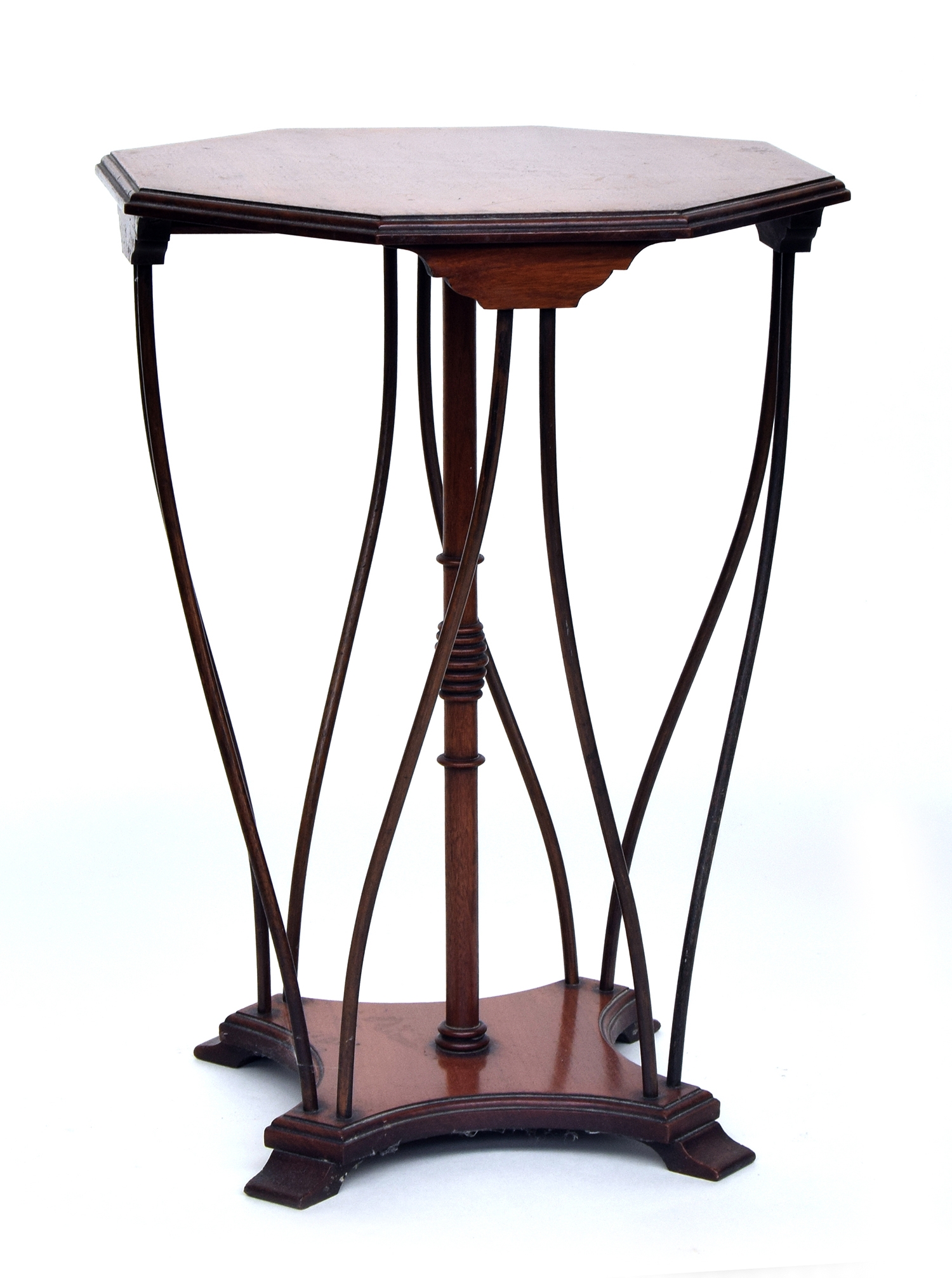 An early 20th century octagonal occasional table, formed on a central turned column with eight