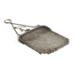 A ladies mesh purse with silver import marked handle, gross weight approx 117g
