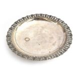 An Egyptian silver salver, marked for 1936/7, the pierced edge decorated with palms and fronds, 34.