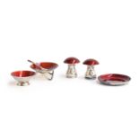 A Danish silver and dark red guilloche enamel cruet set by Egon Lauridsen, comprising a pair of