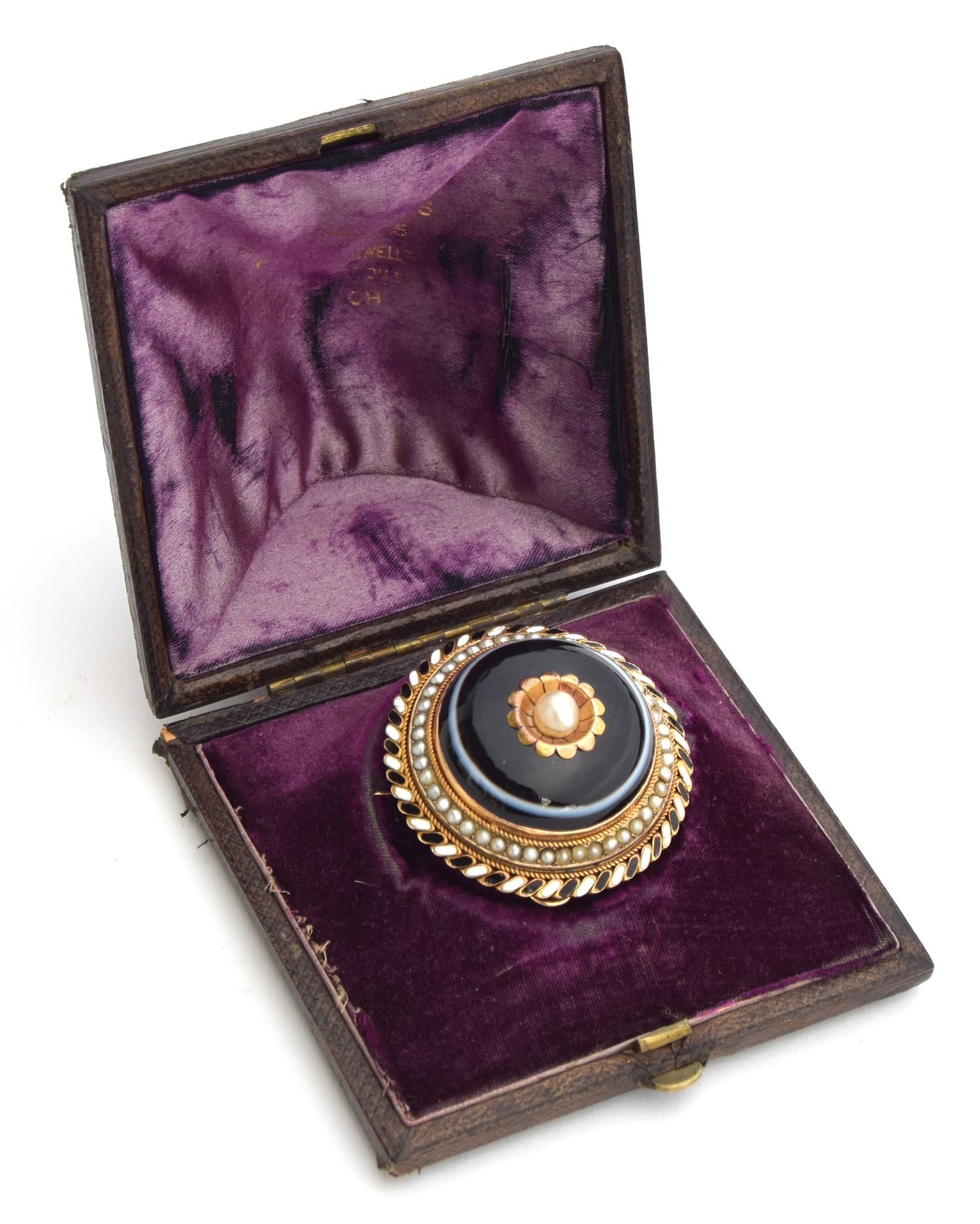 A Victorian mourning brooch decorated, hardstone and seed pearls, approximate gross weight 25g