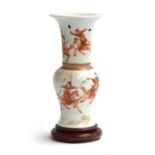A Chinese yenyen vase, decorated in orange and gilt with scenes of warriors riding horses, Kangxi