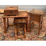 An Arts and Crafts oak footstool with heart cutouts, 30cm2; together with a small oak sewing box and