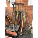 A quantity of vintage tools, together with a terracotta pots and two composite stone planters
