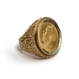 A half sovereign 1936 set within a 9ct gold ring, 12.68g