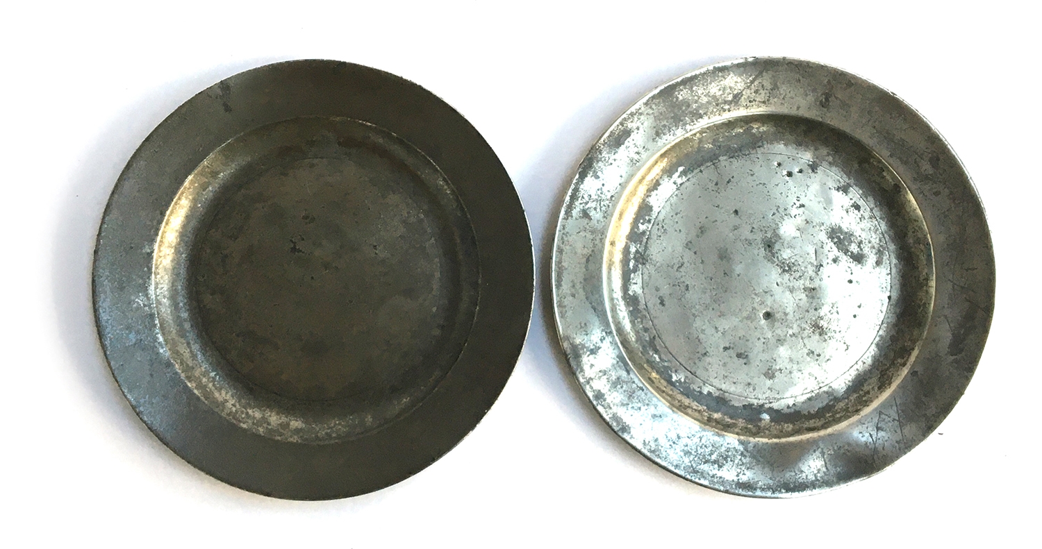 An 18th century London pewter tavern plate, bearing crowned X to reverse, above 'London' and