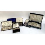 A quantity of cased flatware, to include two sets of silver handled butter knives, plated berry