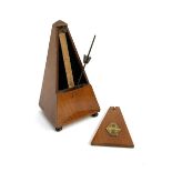 A mechanical metronome marked Maelzel Paris