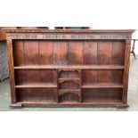 An 18th century Welsh dresser rack, dentil cornice over an arrangement of shelves, 178cmW 111cmH