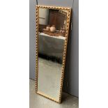 A gilt framed long mirror, 123x42cm