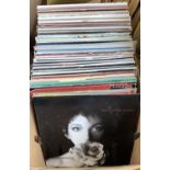 A mixed box of vinyl LPs to include The Stranglers; Elton John; Madness; Howard Jones; The Kinks;