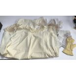 A vintage bedspread, 230x200cm; together with vintage gloves, linen, lace trim smock dress, etc