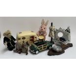 A mixed lot to include Duracell bunny; Sylvanian family caravan; upholstered footstool; jewellery to