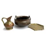 A twin handled Eastern copper pot, 37cmD, together with a copper and brass ewer, 26cmH, and