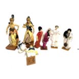 A number of Indian and other dolls, the tallest 38cmH