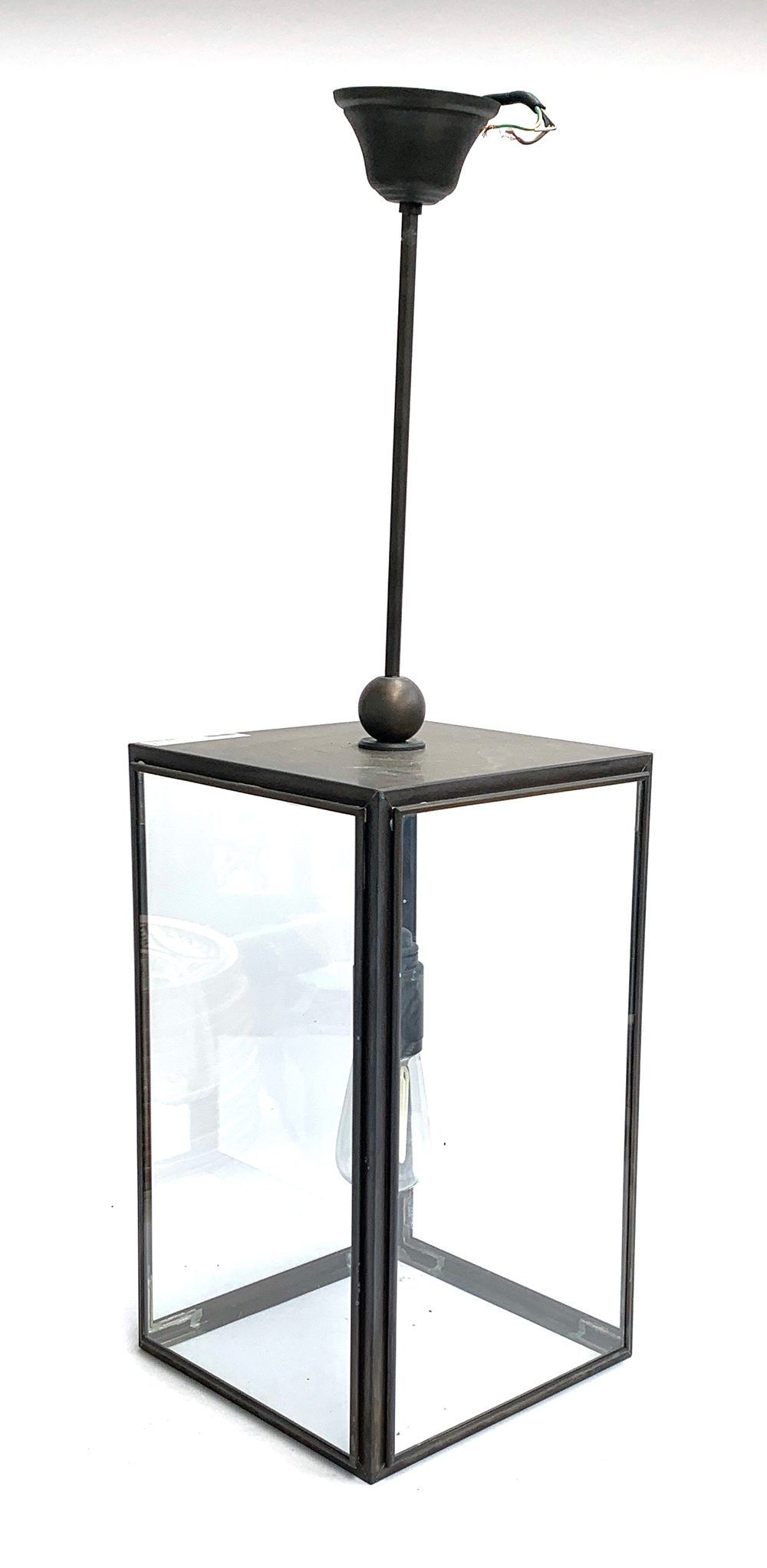 A Tekna Ilforf Closed Top rectangular metal and glass lantern, the lantern 43cmH, 82cmH to top of