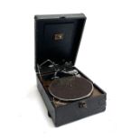 A HMV portable gramophone, with winder
