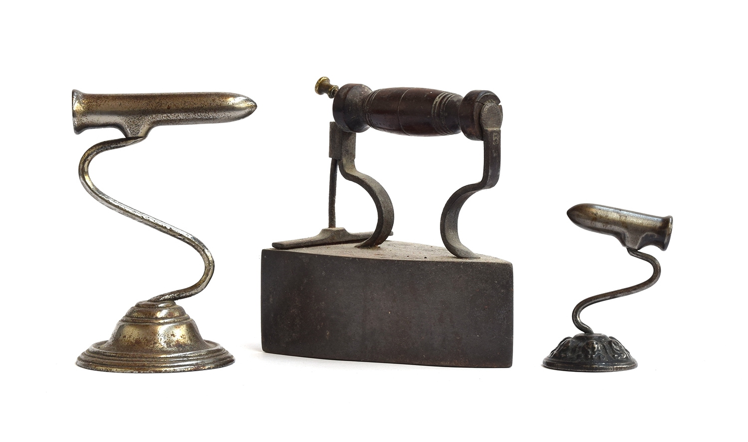 A 19th century goffering iron by W. Bullock & Son, 15cm high; together with one smaller, with