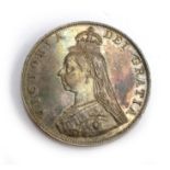 A silver 1887 Queen Victoria Jubilee double florin coin