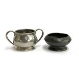 A Liberty & Co. Tudric pewter sugar bowl, marked to base 01372; together with a small bowl, marked