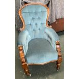 A large Victorian buttonback salon chair, in need of restoration