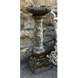 A composite stone birdbath, with floral detail, 77cmH