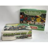 A boxed Subbuteo set together with a boxed Scalextric 200 set