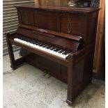 An upright piano by Winkelmann Braun Schweig, 158cm wide, 69cm deep, 132cm high