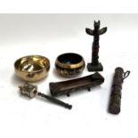 A quantity of Eastern items to include brass bowl; scroll case; prayer wheel; totem