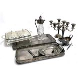 A quantity of silver plated items to include a pair of three arm candlesticks