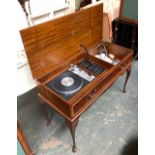A burr walnut radiogram on cabriole legs, 98cmW; together with a pair of matching speakers, by