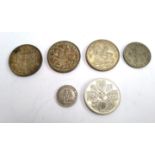 A collection of silver and other coins, to include two George V 1935 crowns; a George VI 1937 crown;