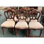 A set of six Victorian dining chairs, with stuffover serpentine seats and turned legs