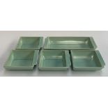 A Susie Cooper Hors d?oeuvres set of ceramic dishes in a wooden tray